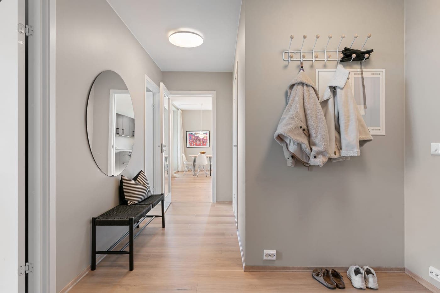 Entryway bench with shoes stored beneath it